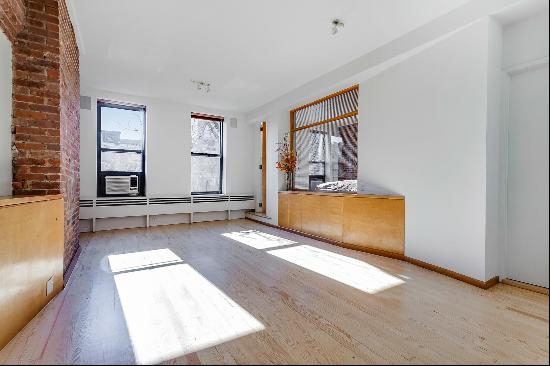 Spectacular 1,300-square-foot fully renovated 3-bed 2-bath apartment nestled on the thi