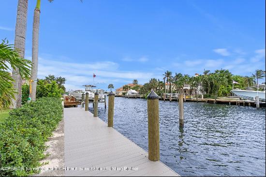 SOPHISTICATED WATERFRONT HOME WITH 75 ft DOCK RENOVATED 2023. The newly redesigned home in