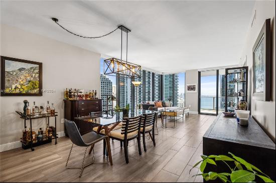 Welcome to this NE corner unit in the coveted 01-line of 1010 Brickell, offering nearly 1,