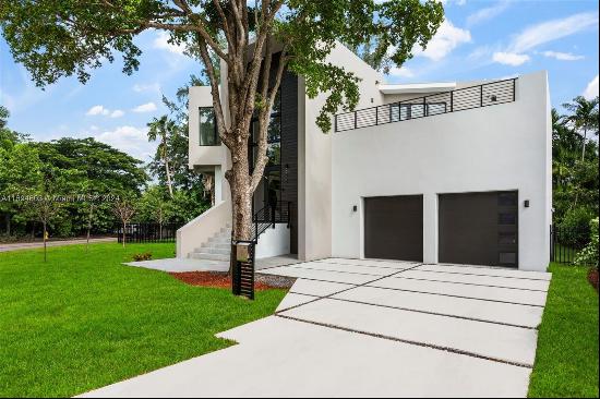 Experience the epitome of modern living in the tranquil Shorecrest/Miami Shores area! This