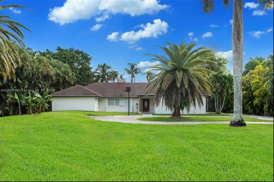 Seize the chance to own a prestigious 2-acre lot situated next to multimillion-dollar home