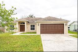 1187 SW Hibiscus Street, Port Saint Lucie FL 34983