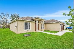 1187 SW Hibiscus Street, Port Saint Lucie FL 34983