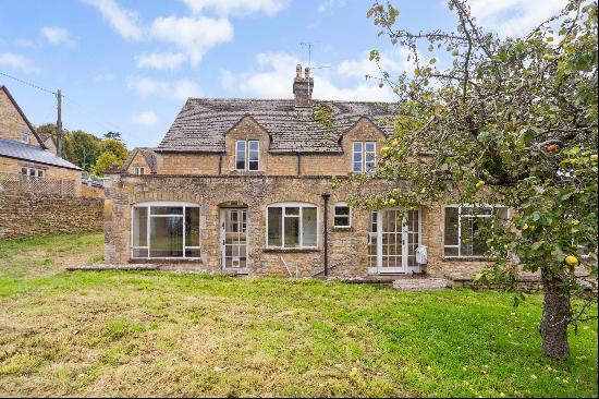 A Cotswold stone house requiring modernisation in highly sought after village.