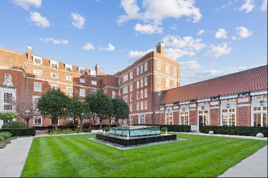 A superb four bedroom apartment in Academy Gardens, W8.