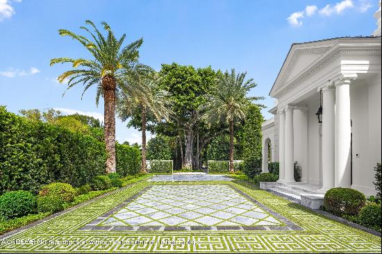 Encompassing almost an acre of prime Palm Beach real estate on Billionaires Row, 1230 S Oc