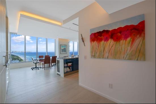 One-of-a-kind spectacular flow thru corner 3 bed 2 1/2 bath unit at Carillon Miami Wellnes