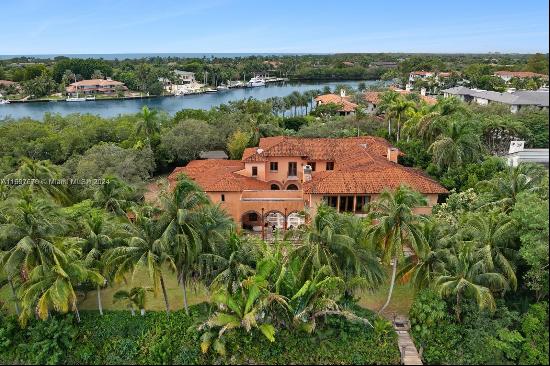 Elevate your expectations in this stunning European-style home in prestigious Gables Estat