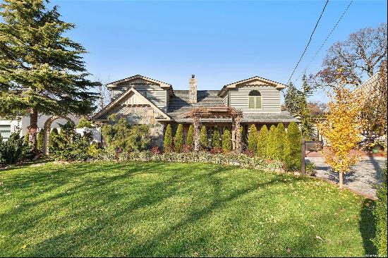 Welcome to this one-of-a-kind picturesque dream home located in the heart of Merrick Woods