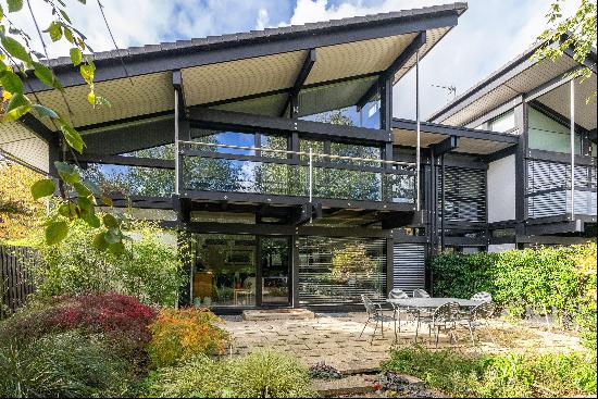 An impressive five bedroom HUF HAUS located on a quiet residential cul-de-sac in the heart