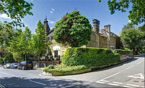 This imposing detached residence, which benefits from 11 bedrooms and a separate 3 bedroom