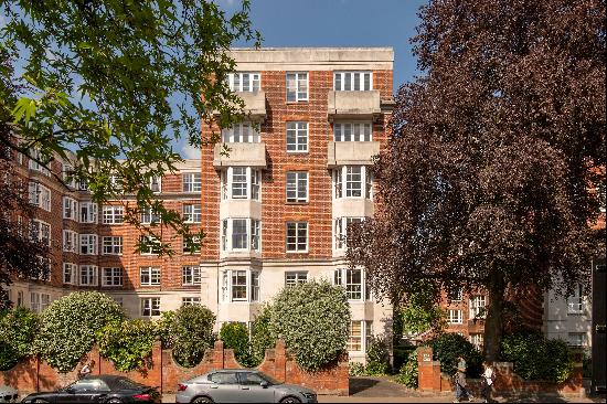 A well presented ground floor apartment located in a prestigious portered Notting Hill man