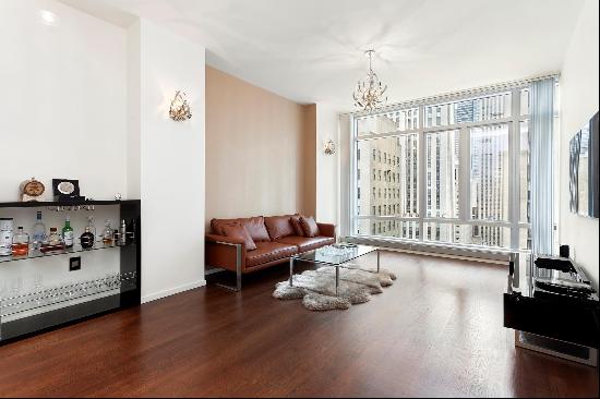 Look no further! Enjoy direct BREATHTAKING VIEWS of Rockefeller Plaza from 10 ft floor-