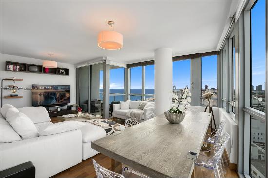 Breathtaking ocean and sunset views of the Downtown Miami Skyline from this exceptional be