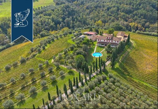 Charming farmstead with agritourism resort for sale on the Tuscan hills