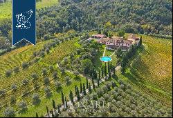 Charming farmstead with agritourism resort for sale on the Tuscan hills