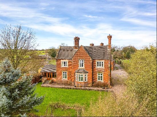 A most attractive 4 bedroom detached Victorian former Vicarage with detached garage block 