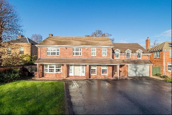 An exceptional family home in a sought-after location backing on to the River Avon, close 