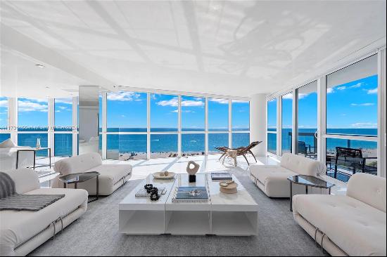 A designer duplex home at the prestigious Setai Miami Beach. This 4-bedroom, 4-bathroom, t