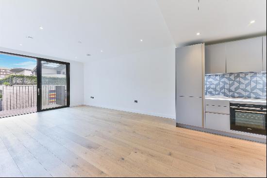 One bedroom apartment with a private balcony, located on the first floor of a modern devel