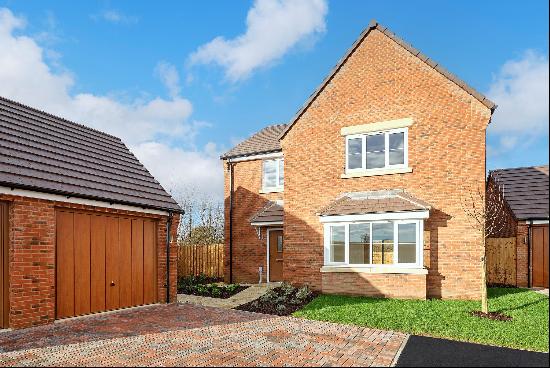 A stunning four bedroom detached new build home with a double garage and driveway, located