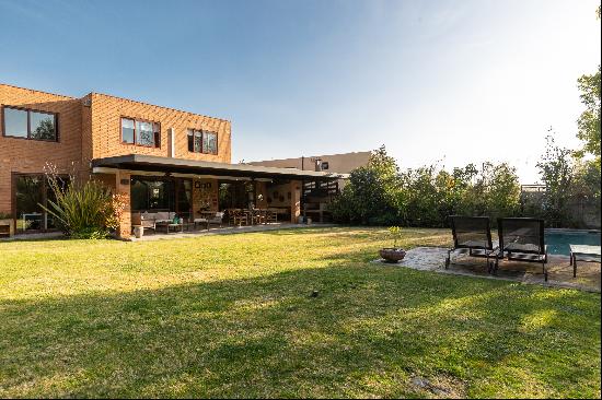 Mediterranean House in Los Bosques Condominium.