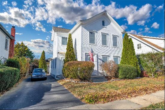 Located in the heart of Greenport Village, this charming home offers an open concept first