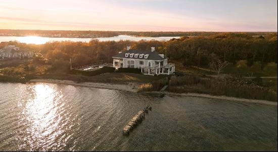 Welcome to a haven of luxury nestled in the tranquil embrace of Center Moriches, East Ends