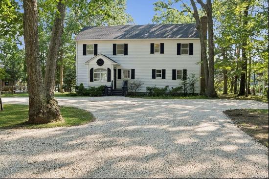 Waterfront living in East Marion .Recently renovated turnkey colonial with expansive secon