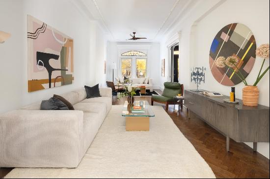 Refined Brooklyn brownstone living awaits in this renovated turnkey two-family residenc