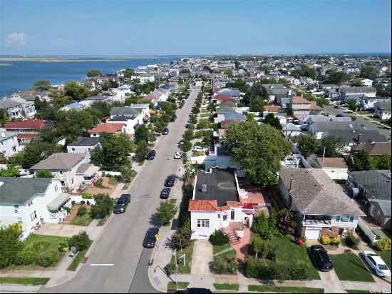 Welcome to this beautiful corner property nestled in the heart of Long Beach. This charmin