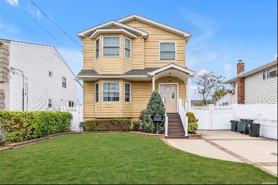 Welcome to your dream home located on a quiet tree-lined street in South Bellmore! This 20