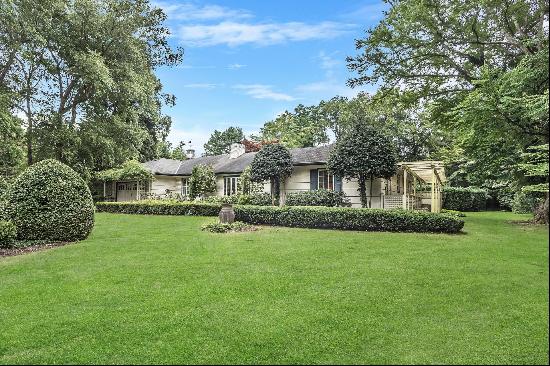 Entertainer's delight! True Locust Valley Charmer. Brick columns and beautiful circular dr