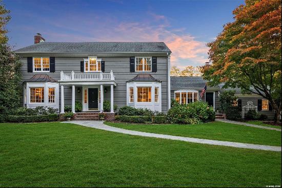 Welcome to this stunning 4-bedroom, 2.5-bathroom Colonial-style home, nestled in the estee