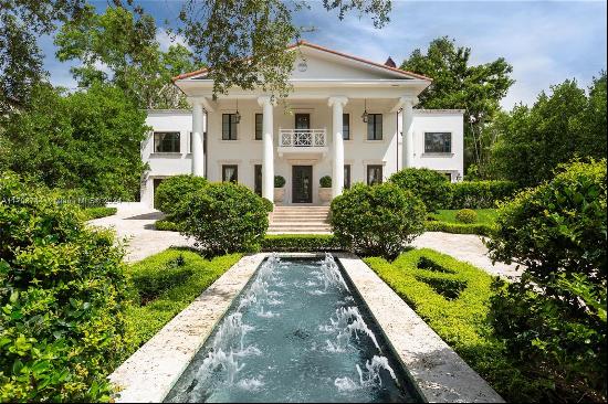 Built for John T. Peacock, one of the founders of Coconut Grove, on over 1 acre, this 8,00