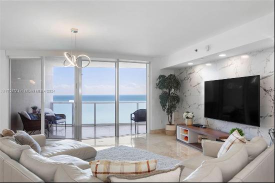 Experience luxurious living in this stunning oceanfront building. This beautifully designe