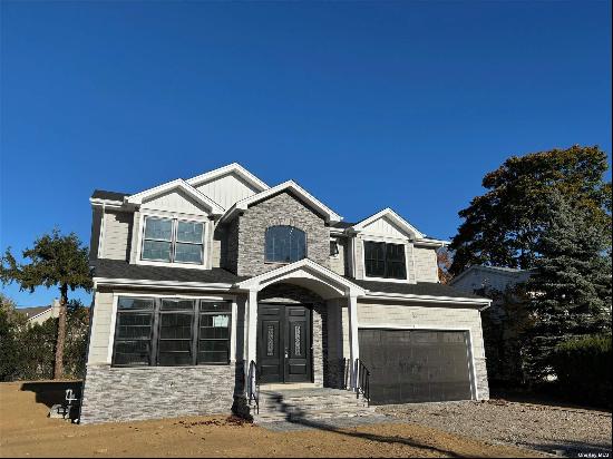 Fabulous Wantagh Woods. Glamorous New Construction.This beautiful home has open concept li