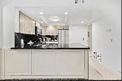   Bright and Spacious Corner-Unit Condominium