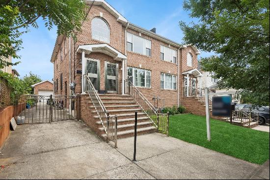 Welcome to this Conveniently located 2 family brick home nestled in the heart of Flushing!