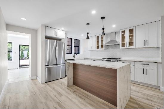 Welcome to Quincy Street; a meticulously gut-renovated 3 family Brownstone nestled in a qu