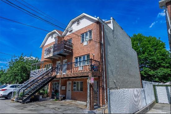 Experience the beauty of Sheepshead Bay living in this stunning 4 4-family house, featurin