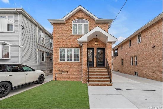 Welcome to this magnificent New Construction Two Family in Whitestone. Brick home with par