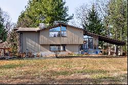 Post-and-Beam Masterpiece Featuring Scenic Views and Lush Gardens