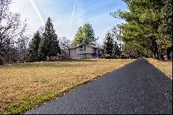 Post-and-Beam Masterpiece Featuring Scenic Views and Lush Gardens