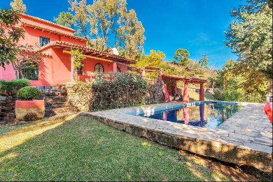 This serene finca-style estate near Benahavis spans over 16,000 sq m, featuring a rustic m