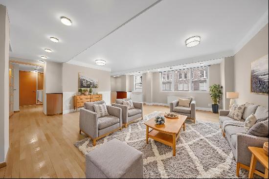 Apartment 9BC at 123 East 75th Street is a sun-filled 2-bedroom, 2-bathroom home in the