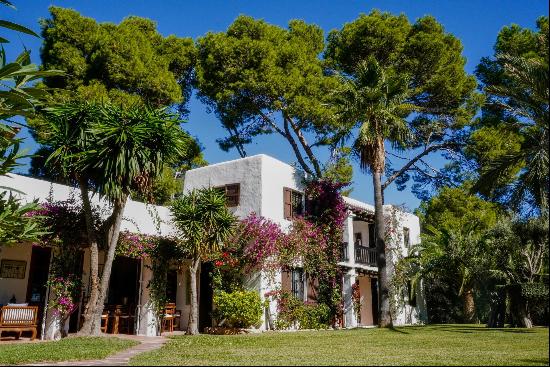 A beautiful finca-style estate with lush gardens.