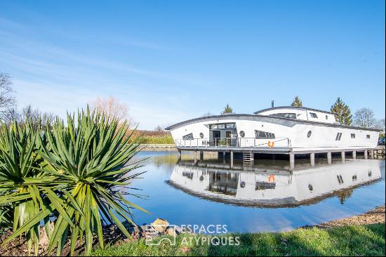 striking home floating above the water