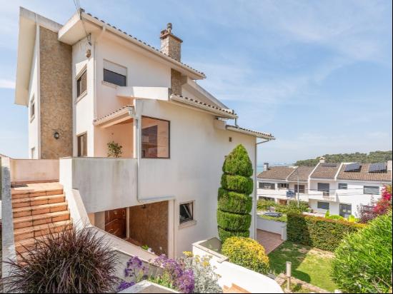 three-story home with panoramic river view