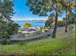 Private, Gated, Bay Frontage, Fixer/Opportunity Home with a Dock